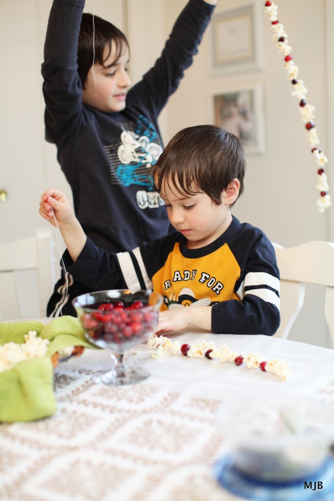 stringing cranberries and popcorn